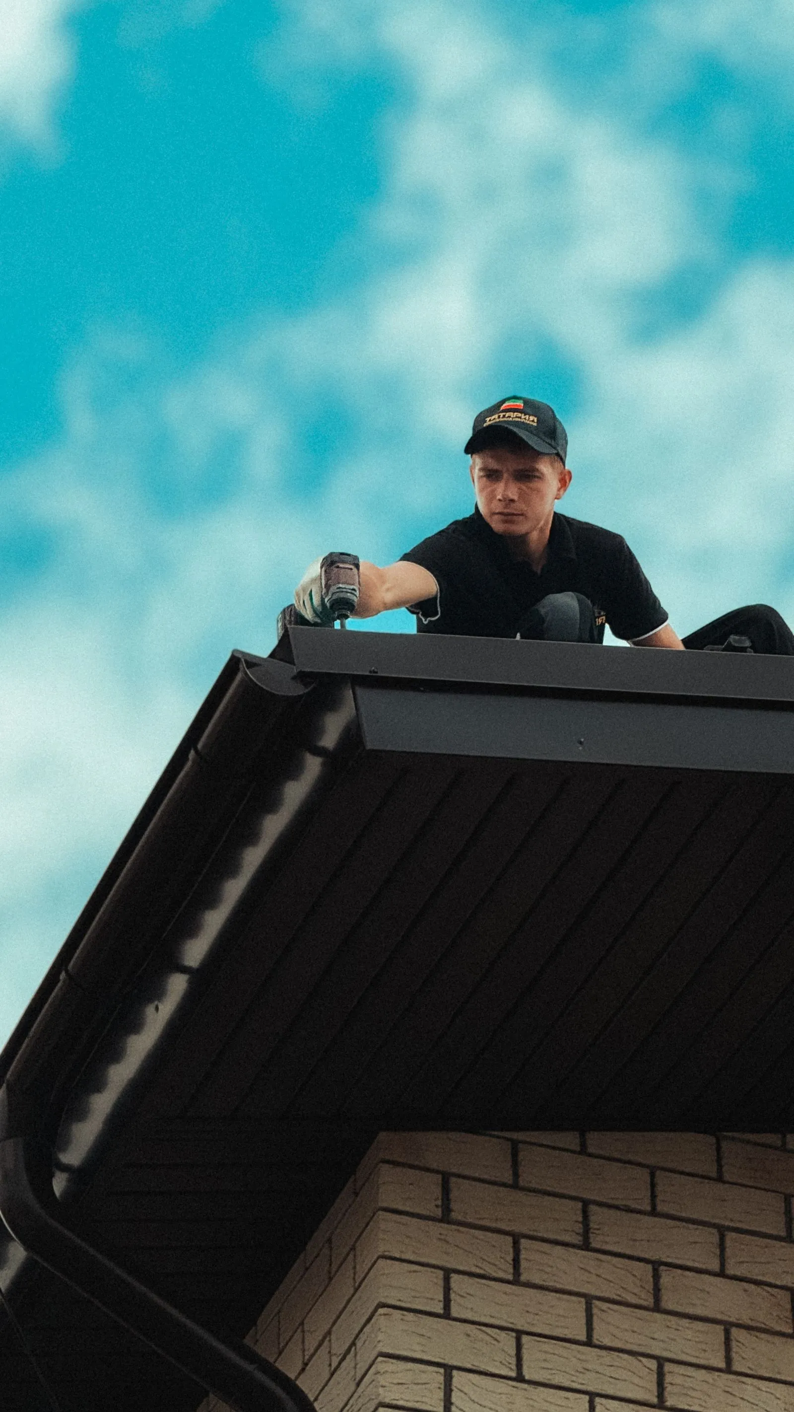 Fascia boards and soffits along the edge of a house roof
